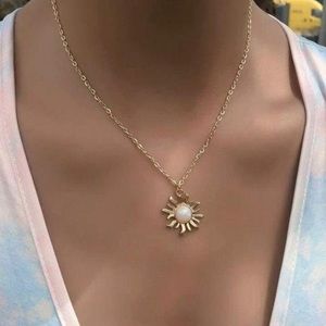 Sun charm necklace